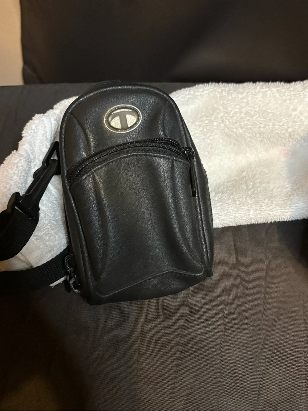 Lowepro Black Camera Shoulder Bag with Compact Holster and a free bag.